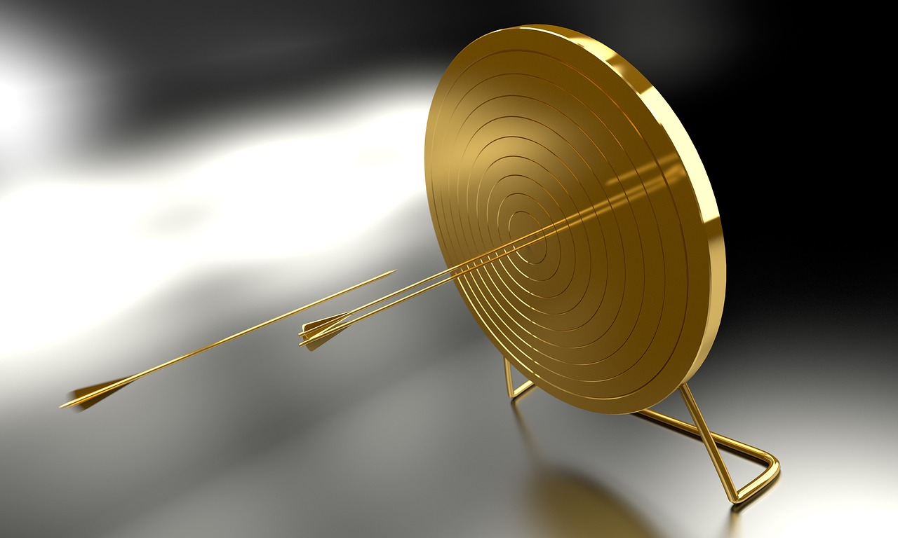Mission — arrow hitting a bullseye representing goals and focus